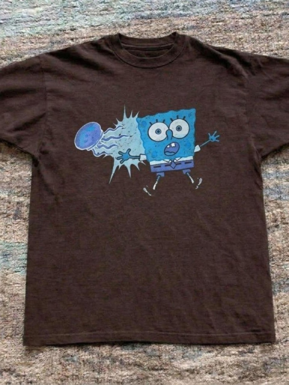 Brown Graphic Tee with Blue Cartoon Print
